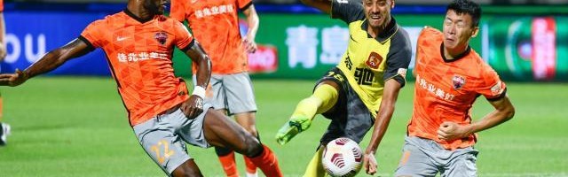 竞彩足球-中超赛场首次击败广州队 卡洛斯：郜林是深足典范